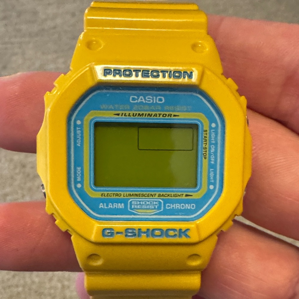 Casio G-Shock Yellow Watch with Blue Dial Accents